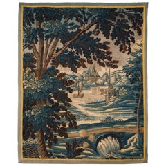 Early 18th Century Aubusson Verdure Tapestry with Trees, a Castle and a River