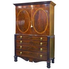 Good English William IV Flame Mahogany Linen Press with Oval Panels and Inlays