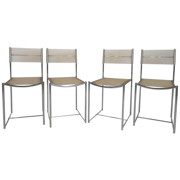 Amazing Set of Four Chrome and Vinyl Cord Dining Chairs at 1stDibs