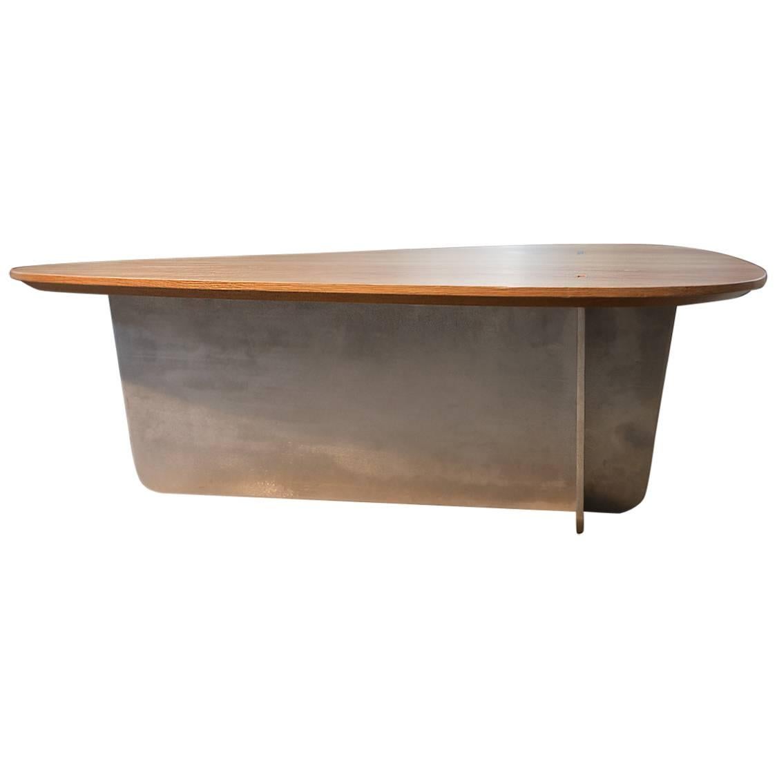 Contemporary coffee table by P. Cramer with metal leg and wooden oak table top For Sale