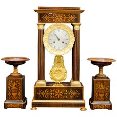 19th century French Portico Clock set with Urns, Rosewood and Lemonwood Inlays