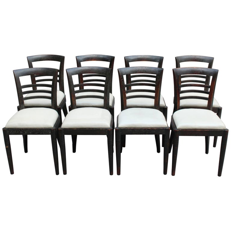 Set of Eight Fine French Art Deco Ebonized Lime Oak Dining Chairs For Sale