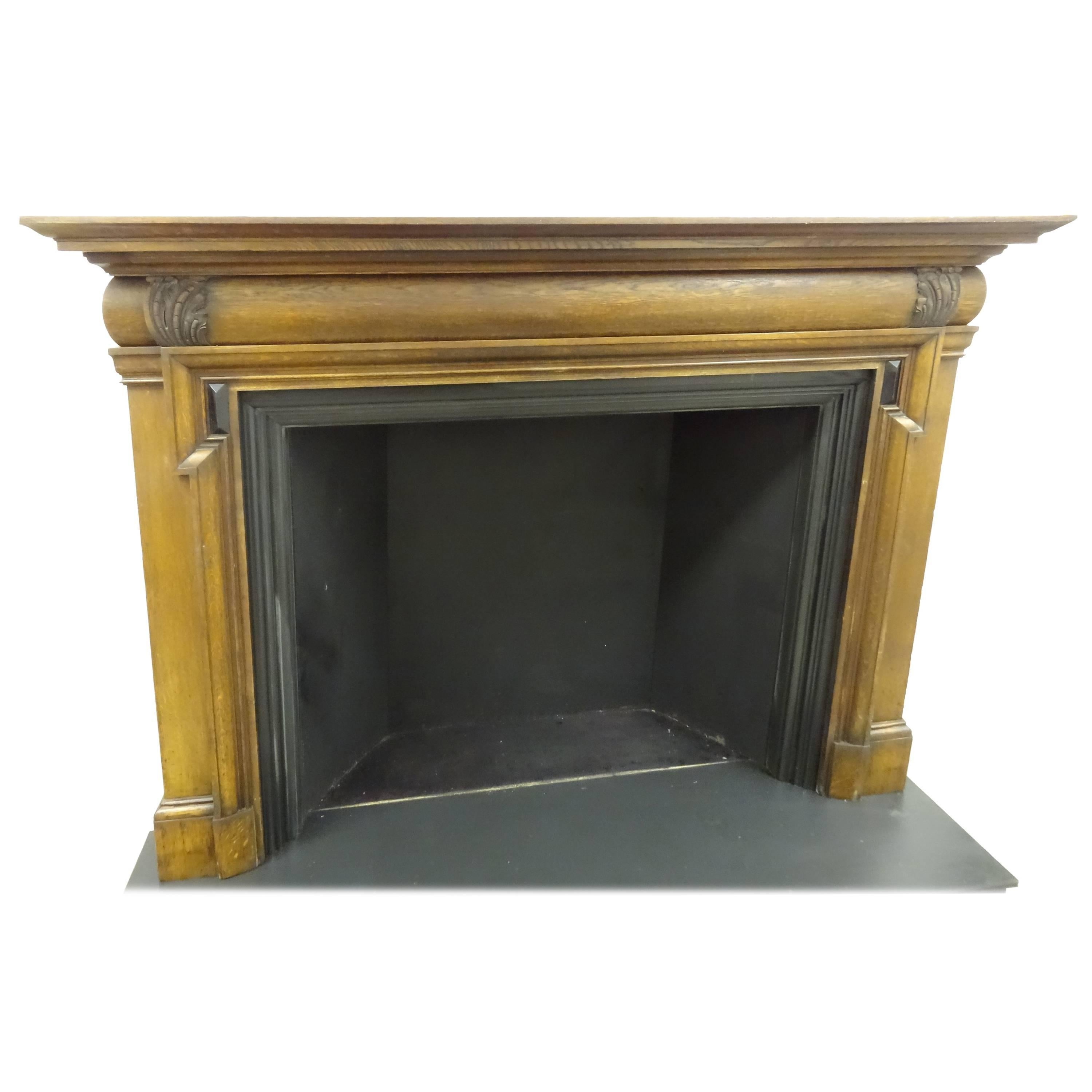 19th Century Victorian Carved Oak and Ebony Bolection Fire Surround For Sale