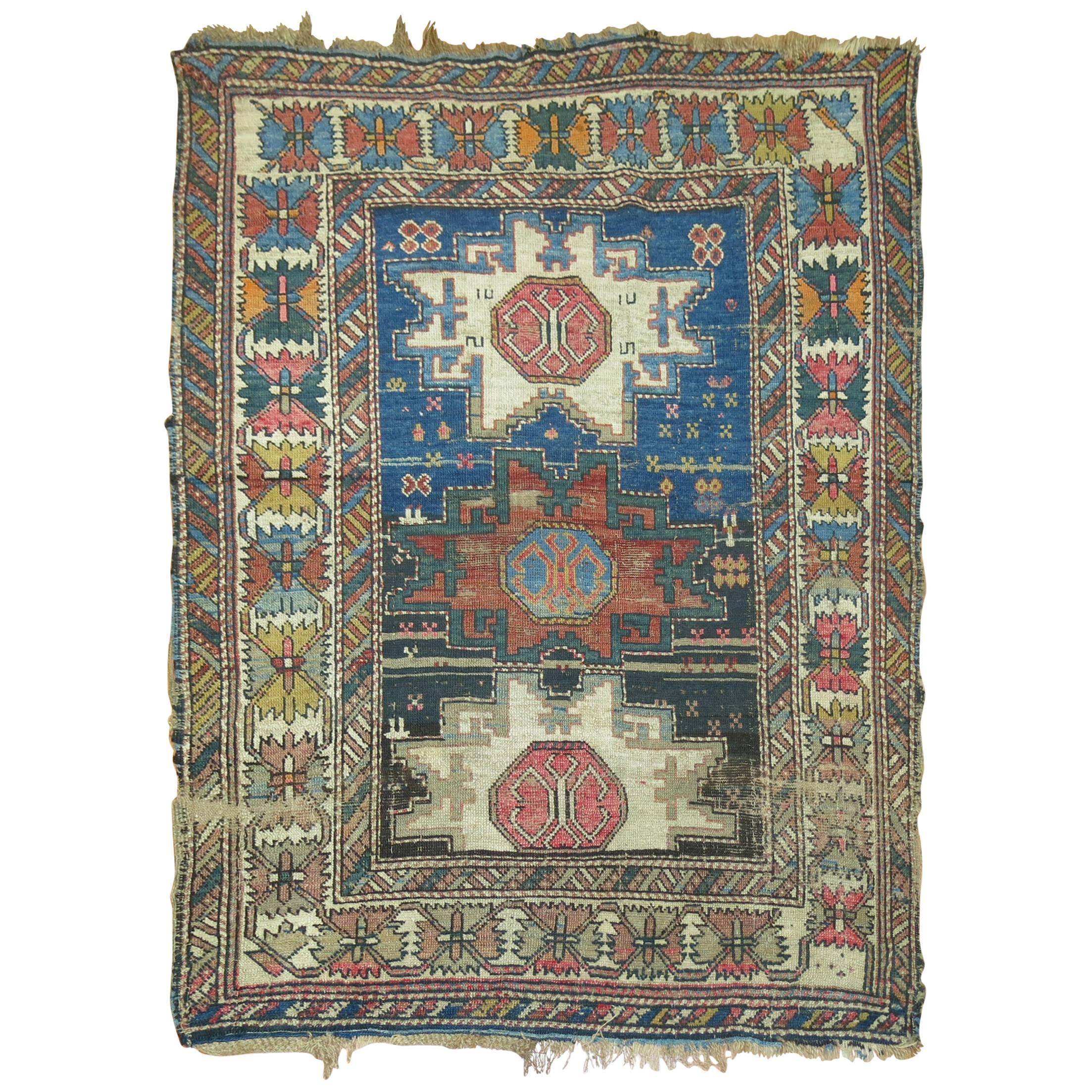 Distressed Antique Caucasian Rug