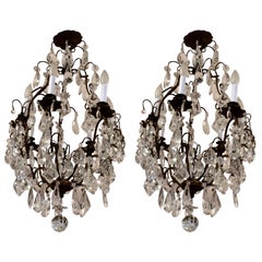 Matching Pair of Glitzy French Gilt Metal and Cut Glass Chandeliers