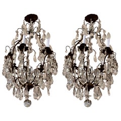 Matching Pair of Glitzy French Gilt Metal and Cut Glass Chandeliers