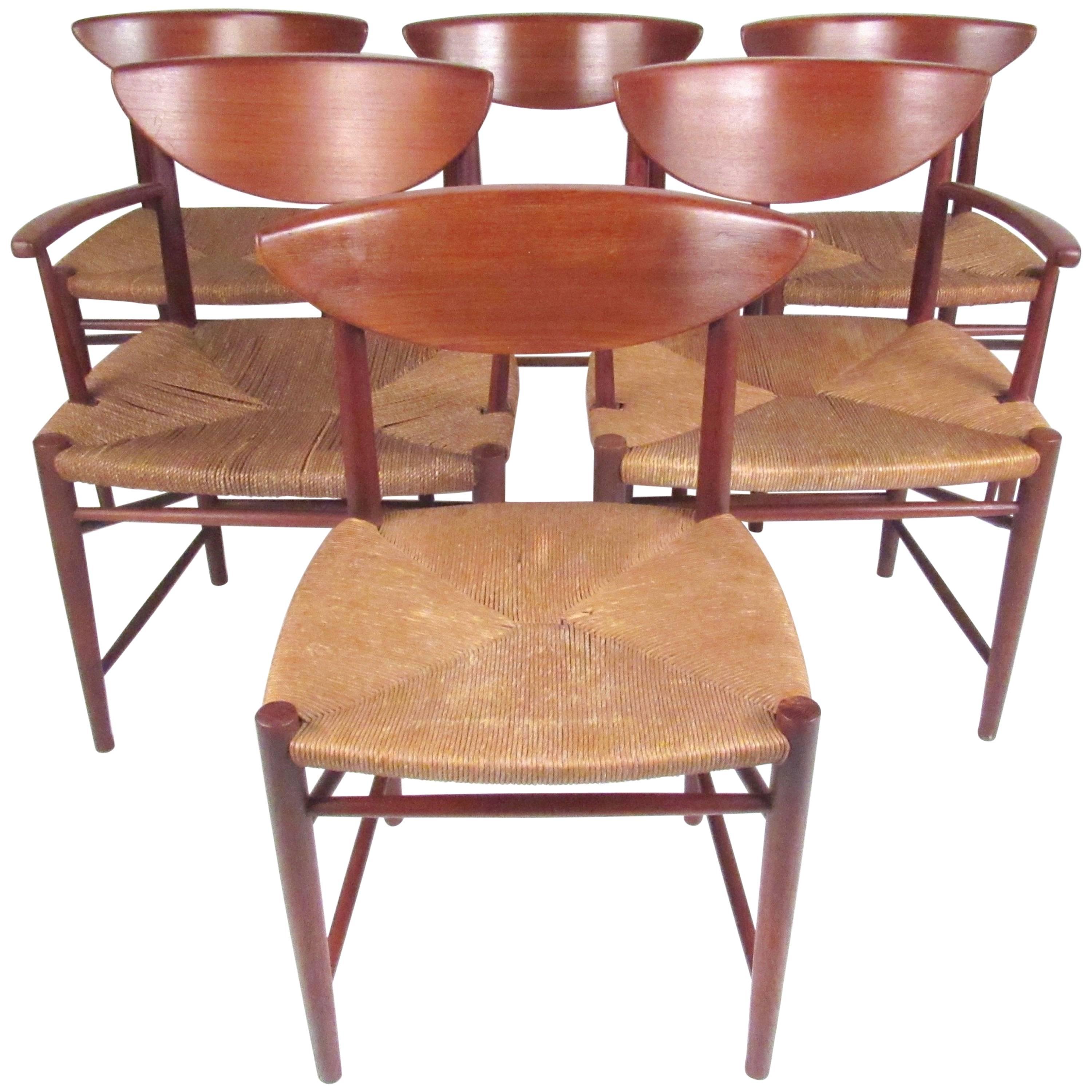Set of Six Peter Hvidt Dining Chairs in Teak and Rush