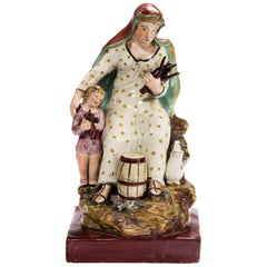 Early 19th Century Ralph Woods Type Staffordshire Figure of a Lady with Faggots