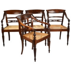 Set of Four British Colonial Hardwood Open Armchairs
