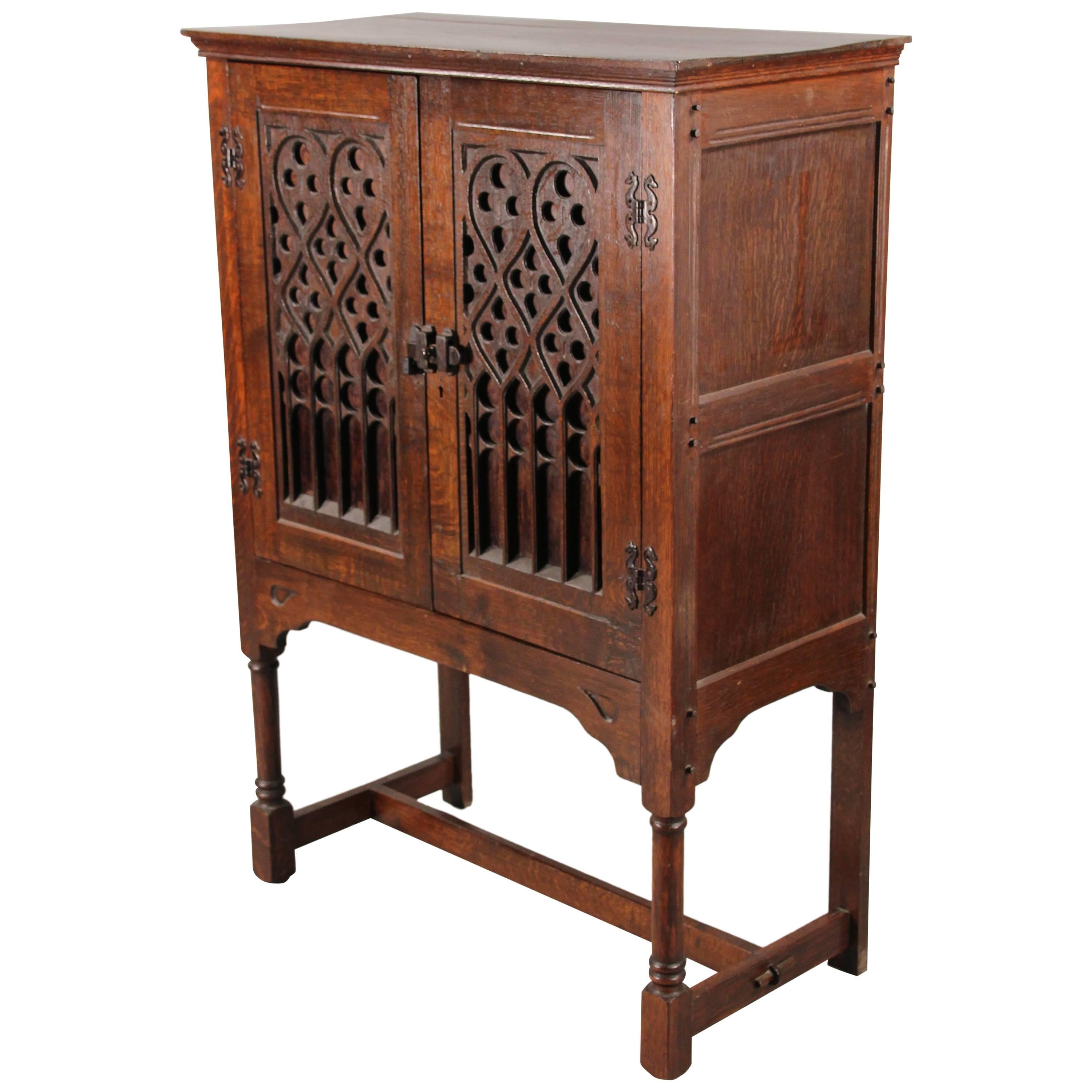Turn of the Century Spanish Revival Cabinet with Carved Front with Iron Hardware