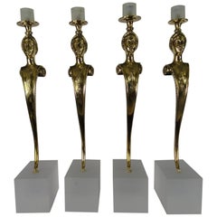 Set of Four 20th Century Polished Bronze Candleholders