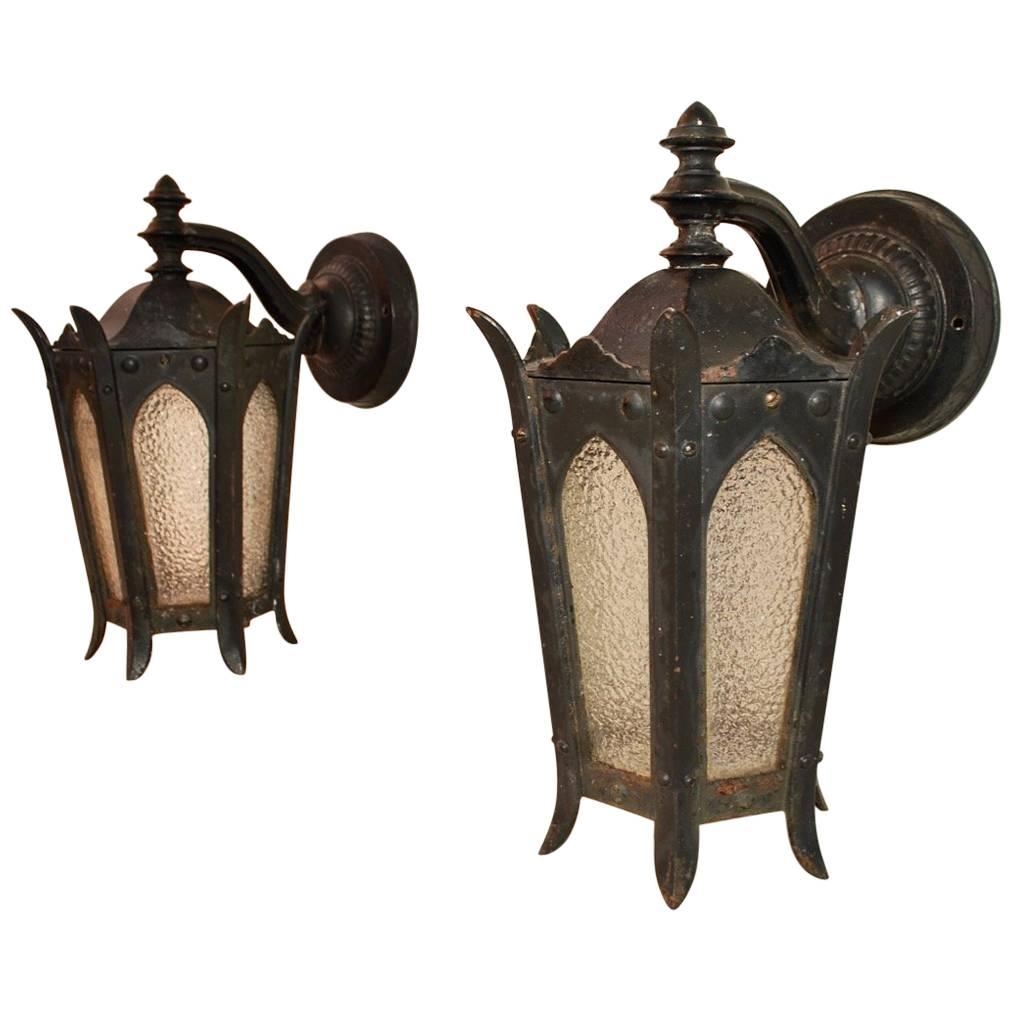 Elegant Pair of 1920s Solid Cast Iron Outdoor Sconces