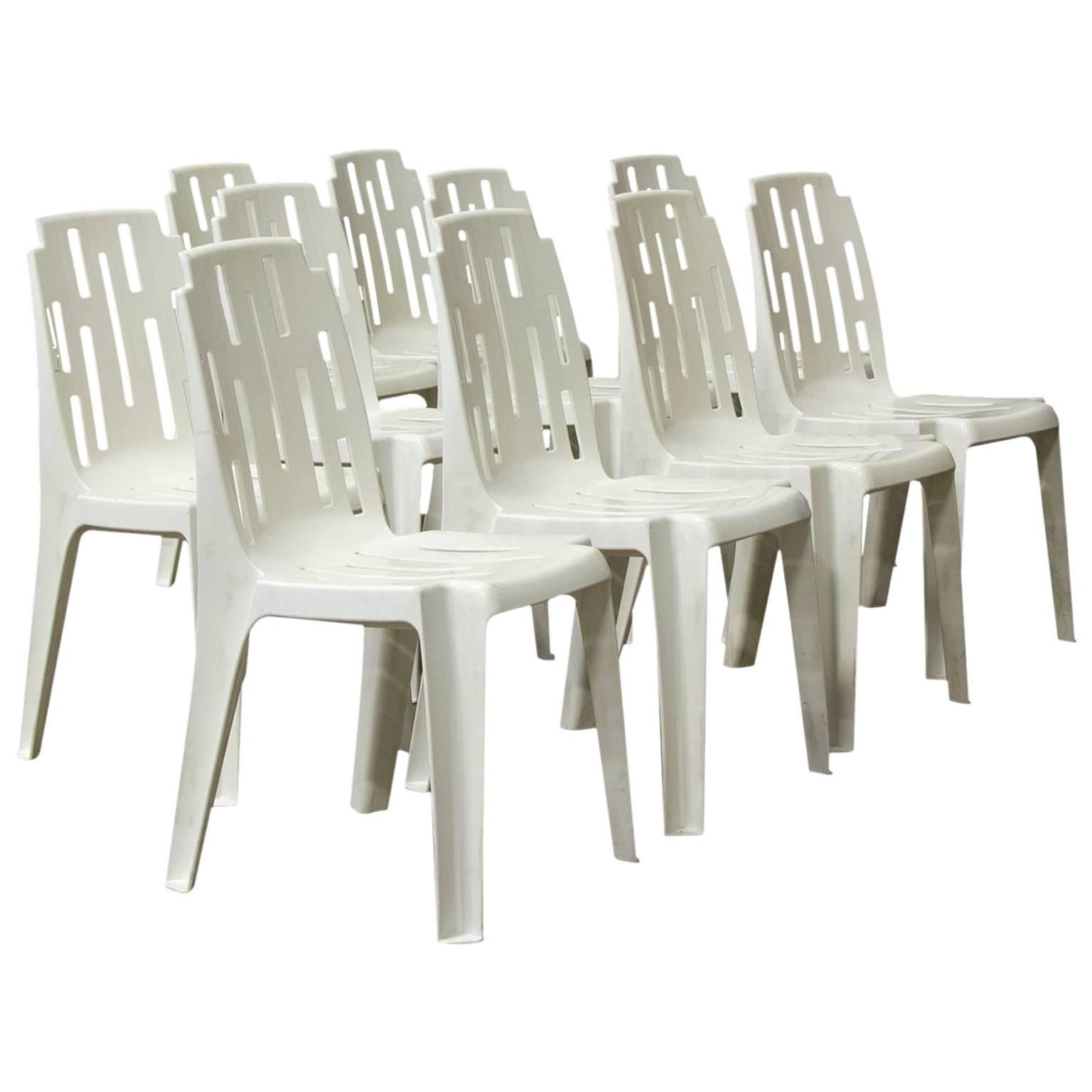 Dix chaises de jardin très élégantes et confortables blanches claires Pierre Paulin, 1974