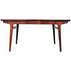 Johannes Andersen Rosewood Draw-Leaf Dining Table, Denmark Johannes Andersen Rosewood Draw-Leaf Dining Table, Denmark