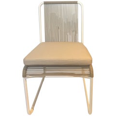 Outdoor Dining Chair by RODA in Milk and Sand Color with Ivory Seat Cushion