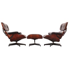 Pair of Vintage Rosewood Eames 670 Lounge Chairs with Ottoman