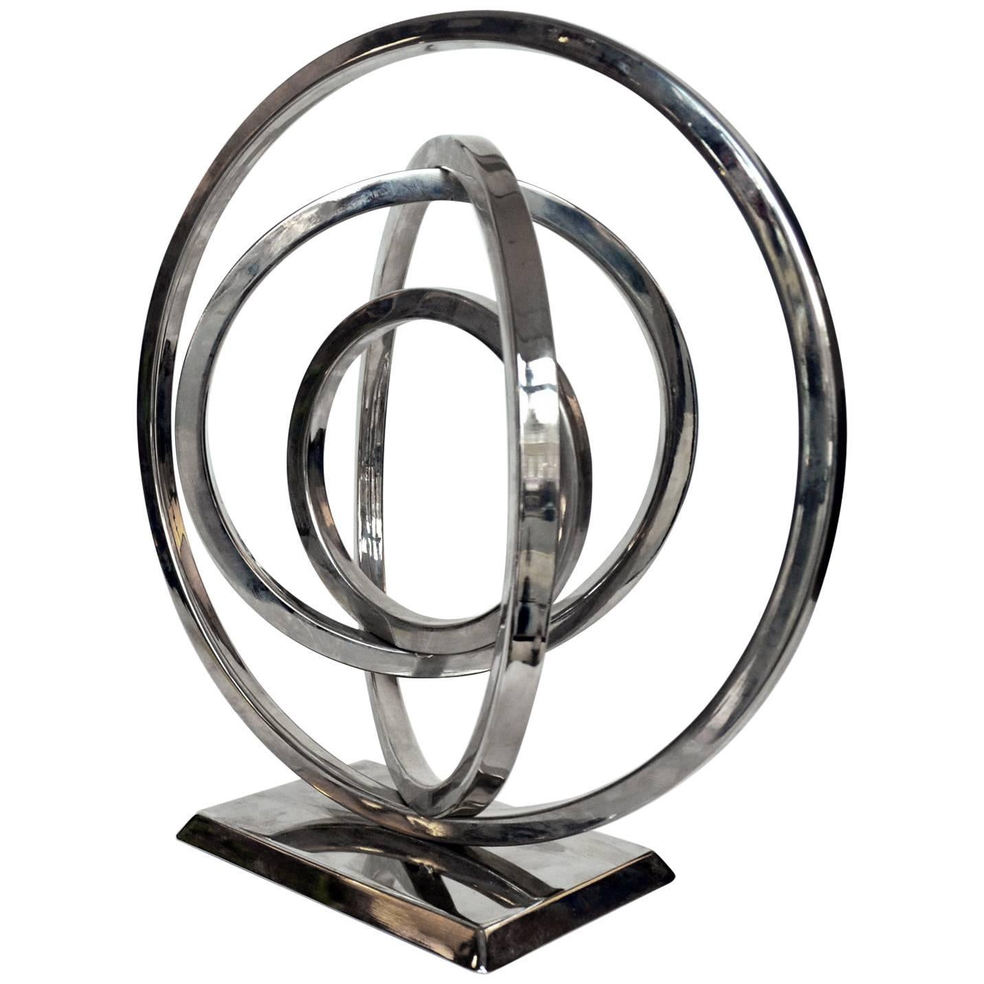 Abstract Sculpture of Rings in Chrome Metal