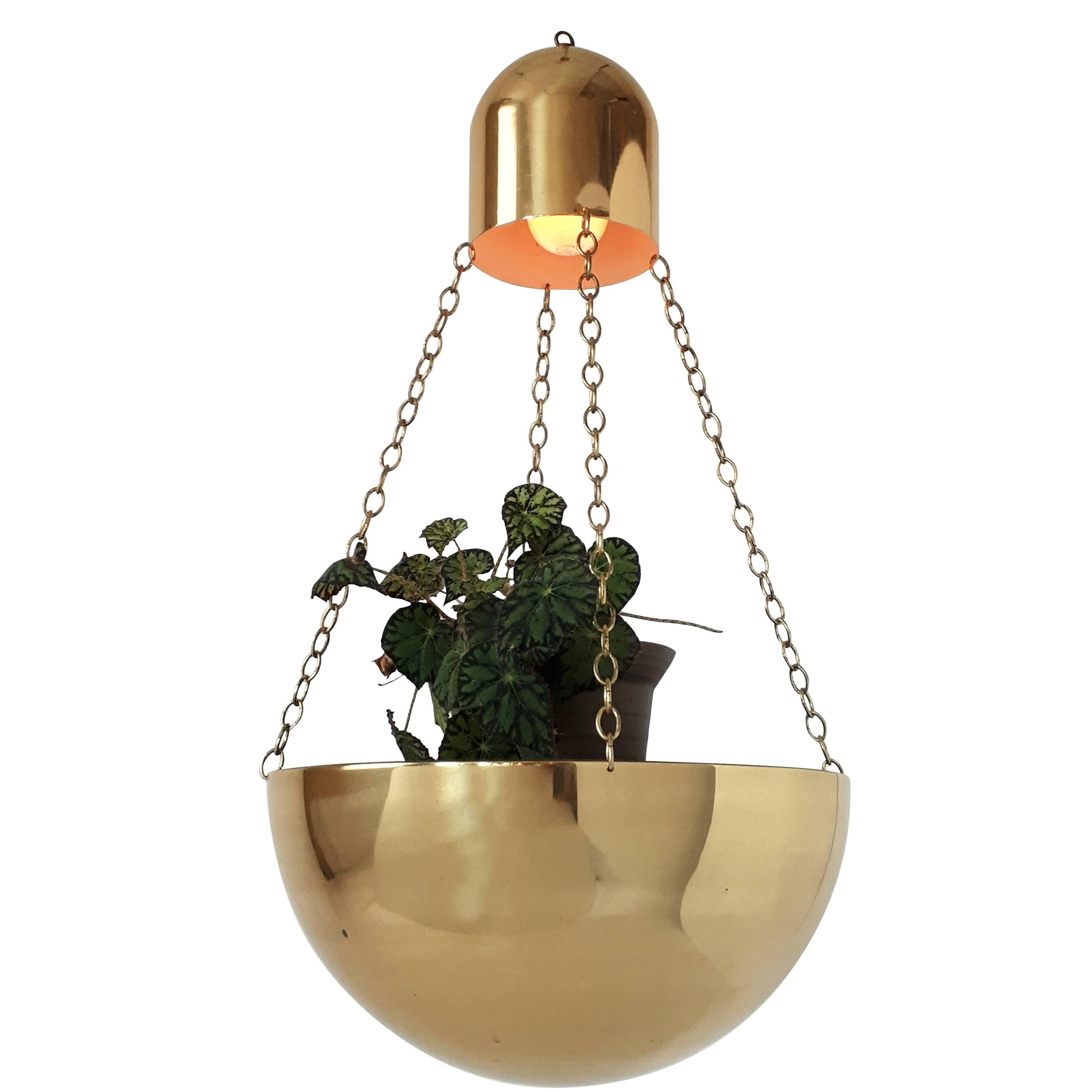 Large brass-plated lighted planter with chain. 

The top vented part contain one regular E26 size socket rated at 100 watts max.

Measure 30 inches high by 15.75 wide. 

Come with 12 feet of wire with a  chain of equal lenght to support weight of