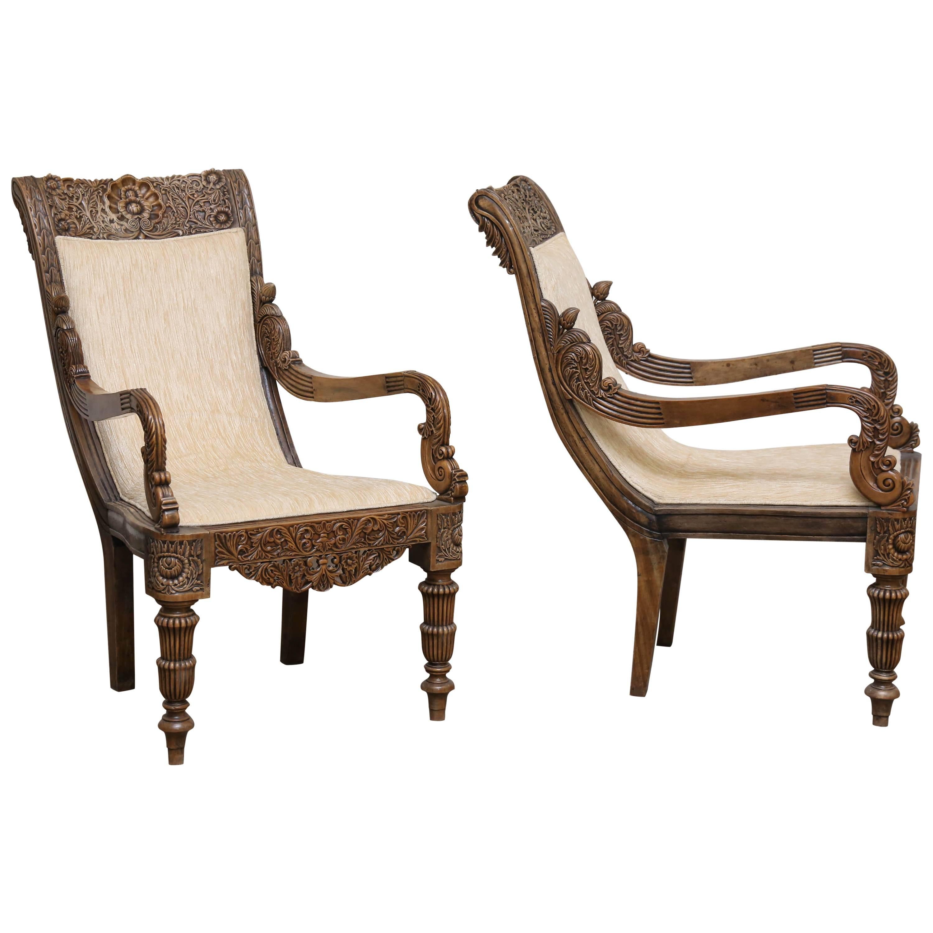 Pair of 19th Century Solid Satinwood Intricately Carved Plantation Chairs For Sale