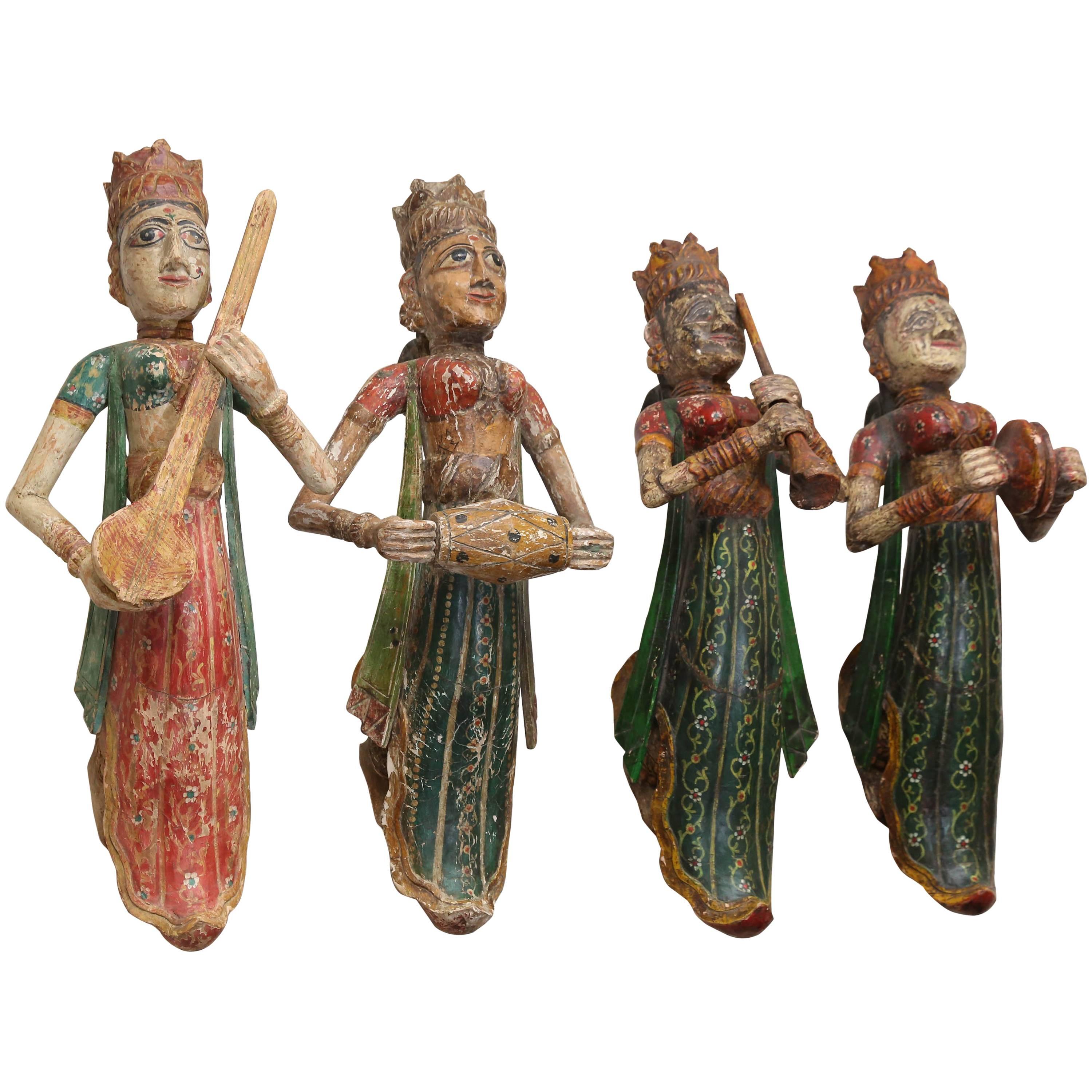 Four 1920s Solid Wood Figures of Lady Musicians from a Jain Temple in Gujarat For Sale