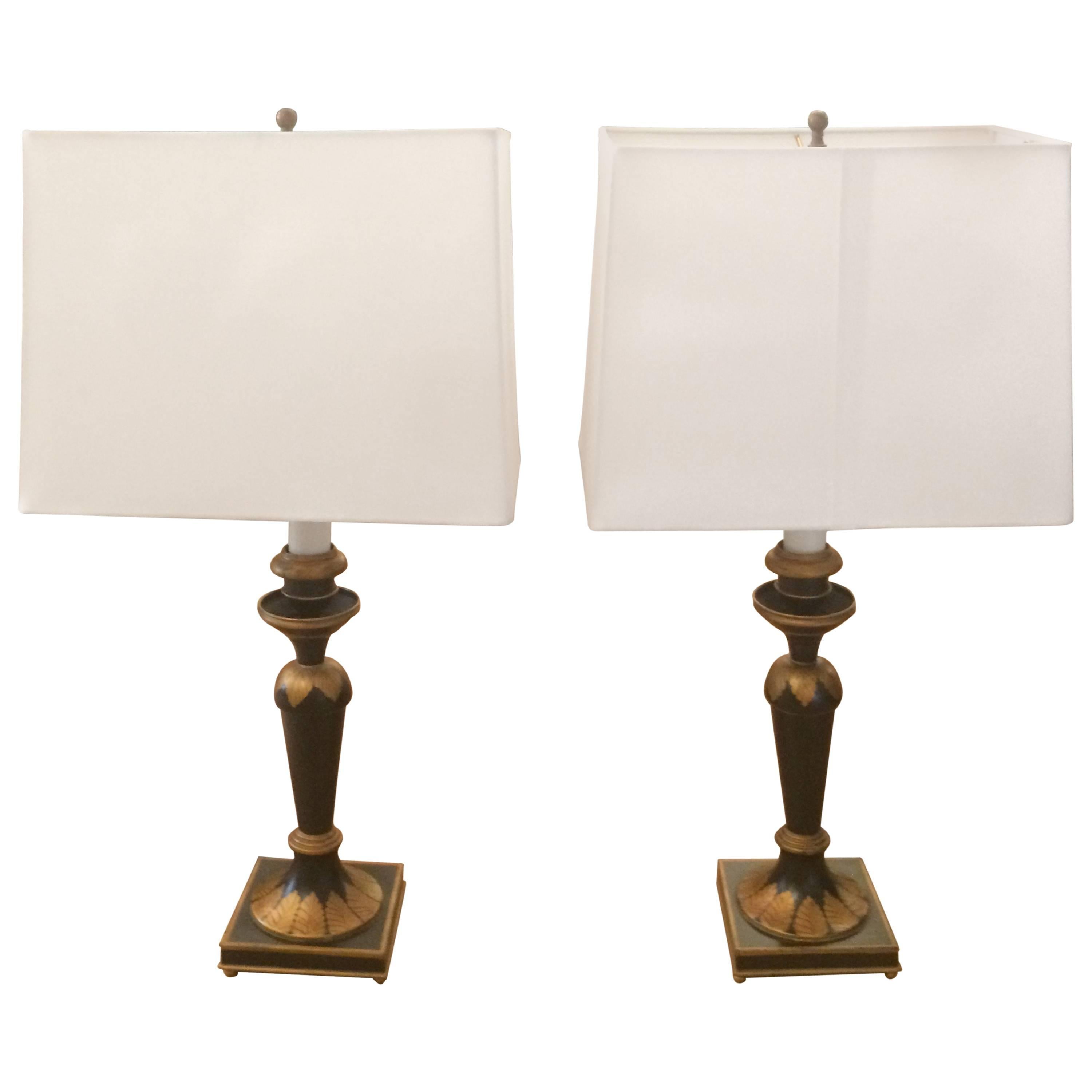 Pair of Ebonized and Gold Table Lamps