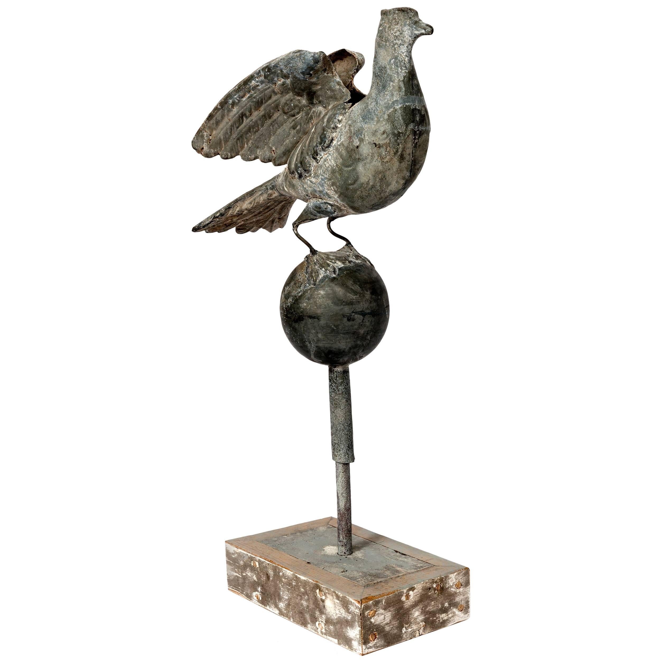 Tall Zinc Bird on Globe with Stand