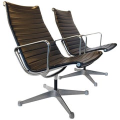 Charles Eames for Herman Miller Aluminium Group Swivel Lounge Chairs