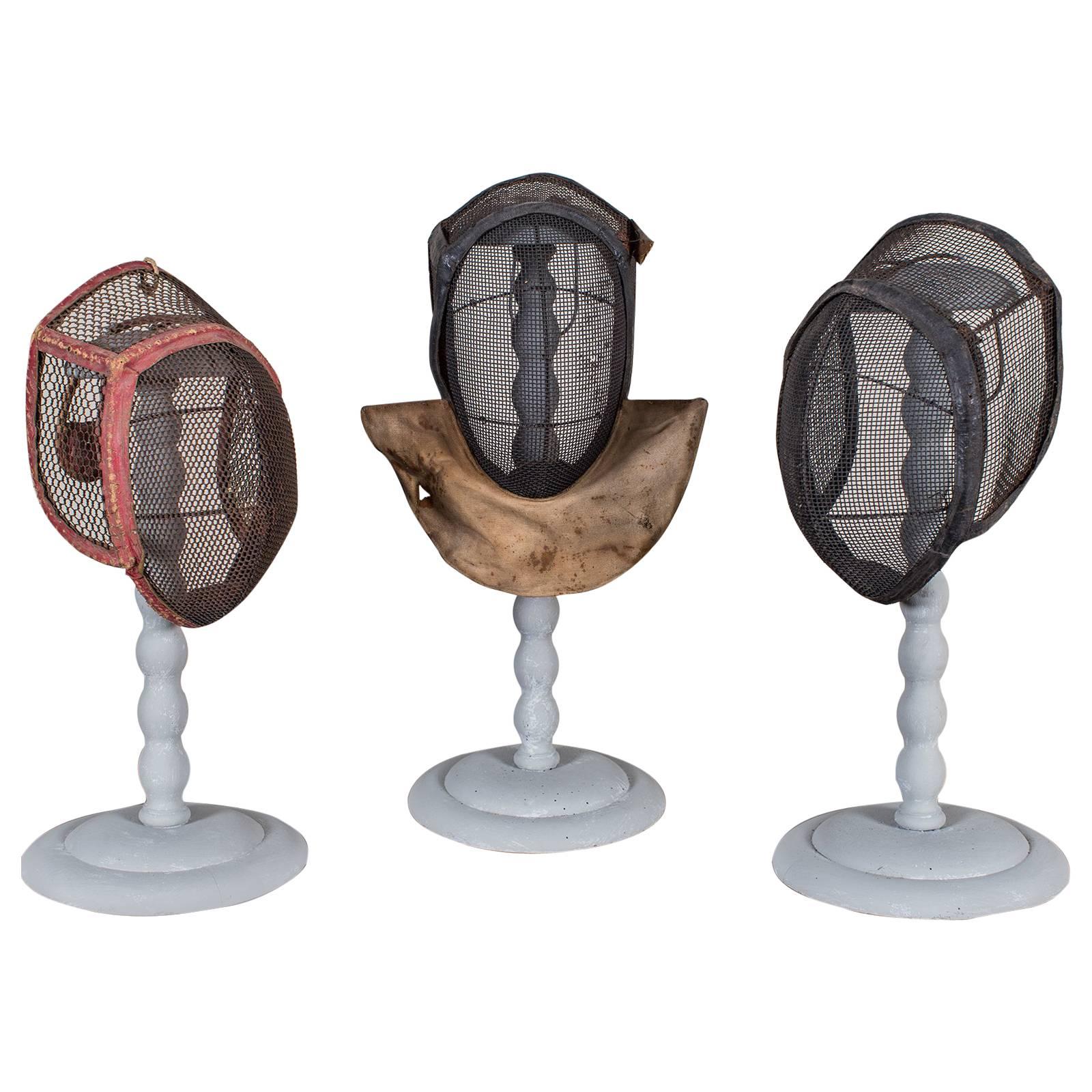 Set of Three Antique French Fencing Masks, circa 1910 Each on a Stand