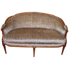 Antique Louis XVI Style Walnut Sofa Newly Upholstered in a Leopard Pattern Chenille