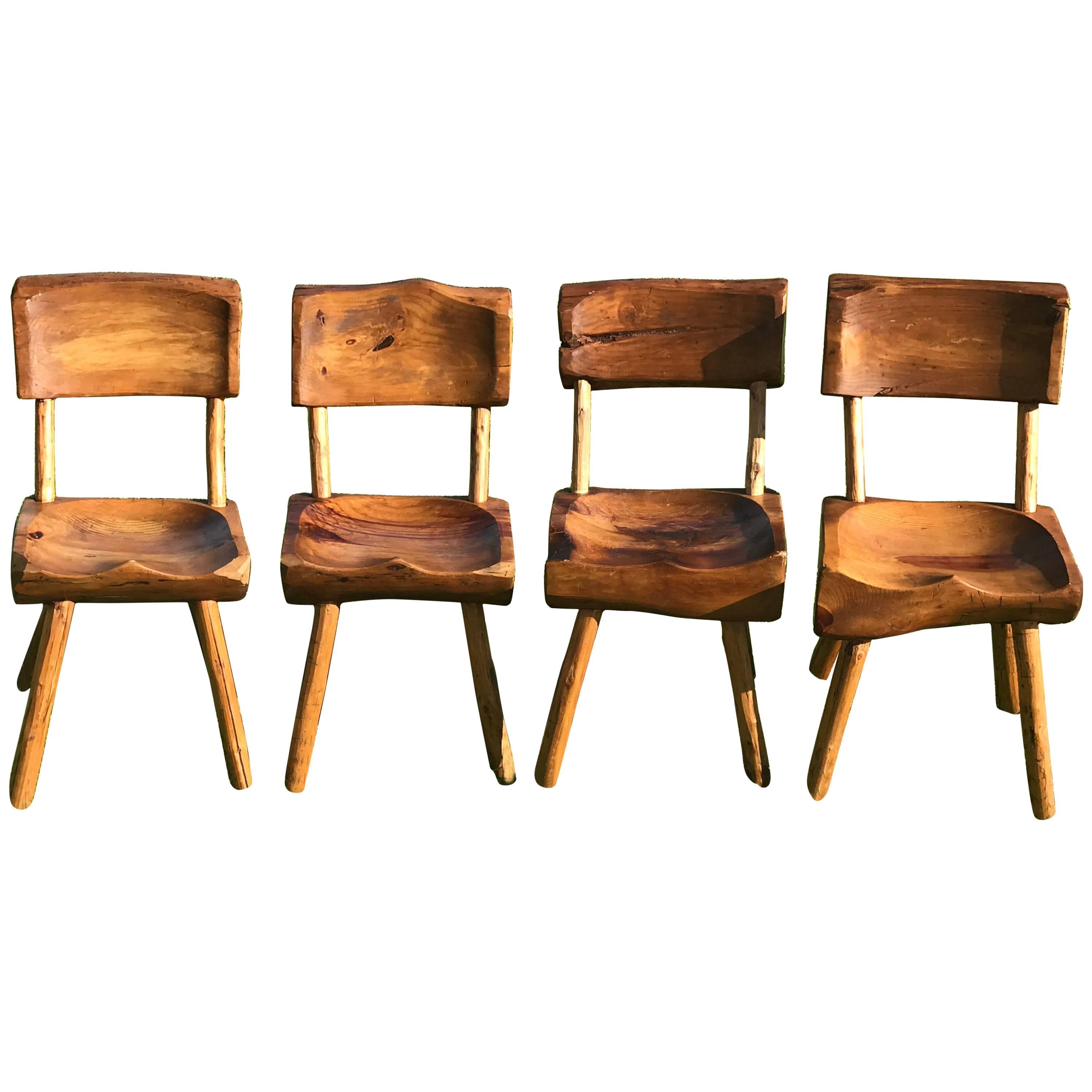 Four Adirondack Carved Chairs