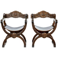 Pair of Early 20th Century Carved Oak X-Frame Armchairs