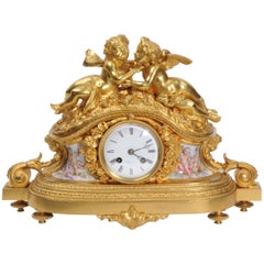 Fine and Early Ormolu and Porcelain Clock, Cherubs