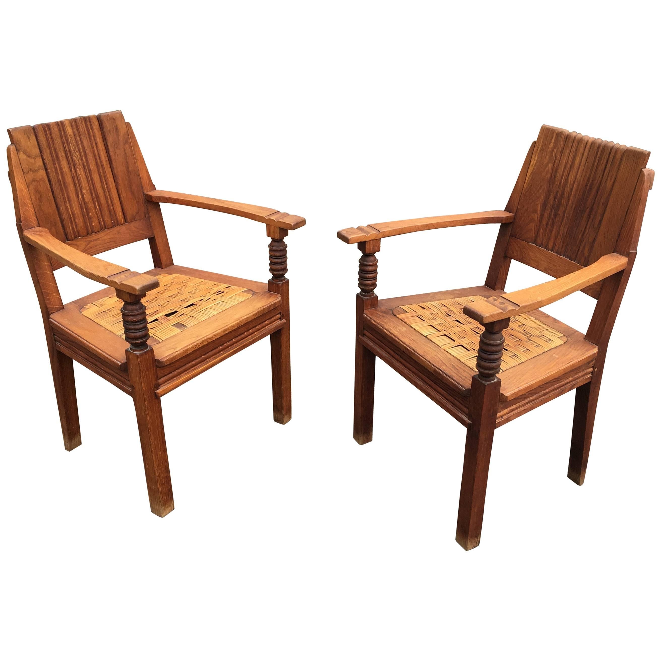 Charles Dudouyt, two Armchairs in Solid Oak and Wicker circa 1940