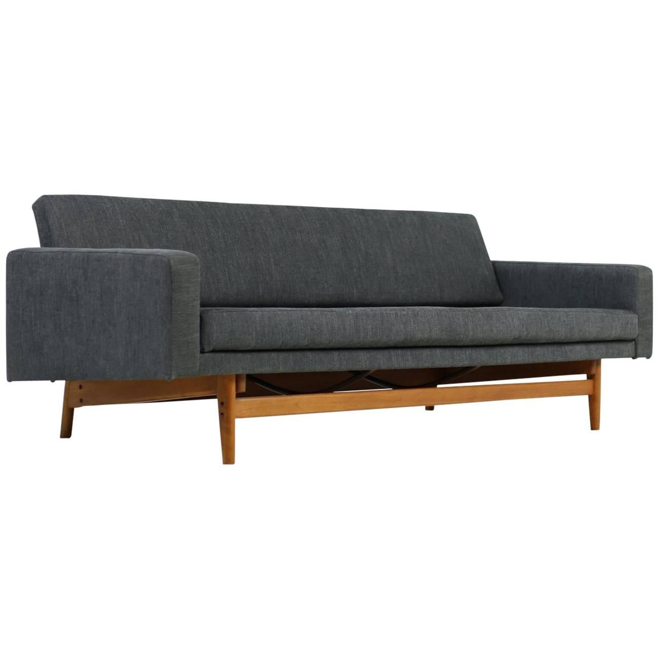 Very rare 1960s sofa/daybed by Karl Erik Ekselius for JOC Sweden, very rare model, restored. Beechwood frame in very good condition, the upholstery was renewed and covered with a very high quality cotton/linen fabric in dark grey, freestanding,