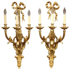 Important Pair of French Louis XVI Gilt Bronze Three-Light Wall Sconces