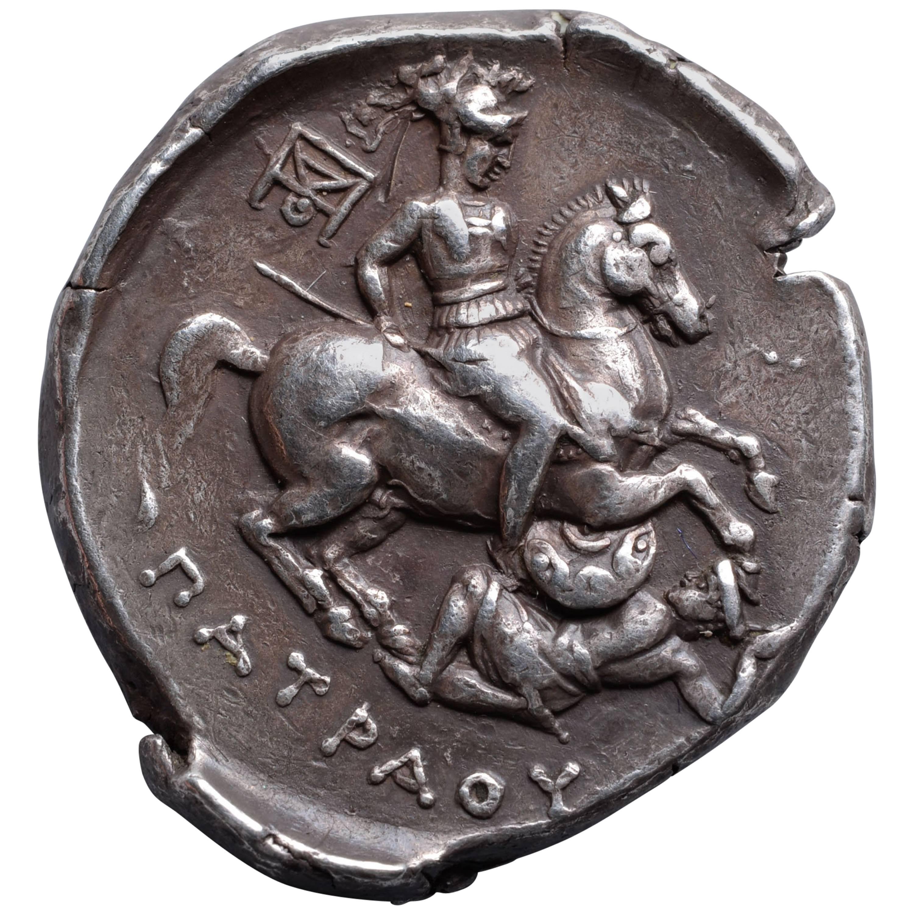 Ancient Greek Silver Tetradrachm Coin with a Warrior on Horseback, 335 BC