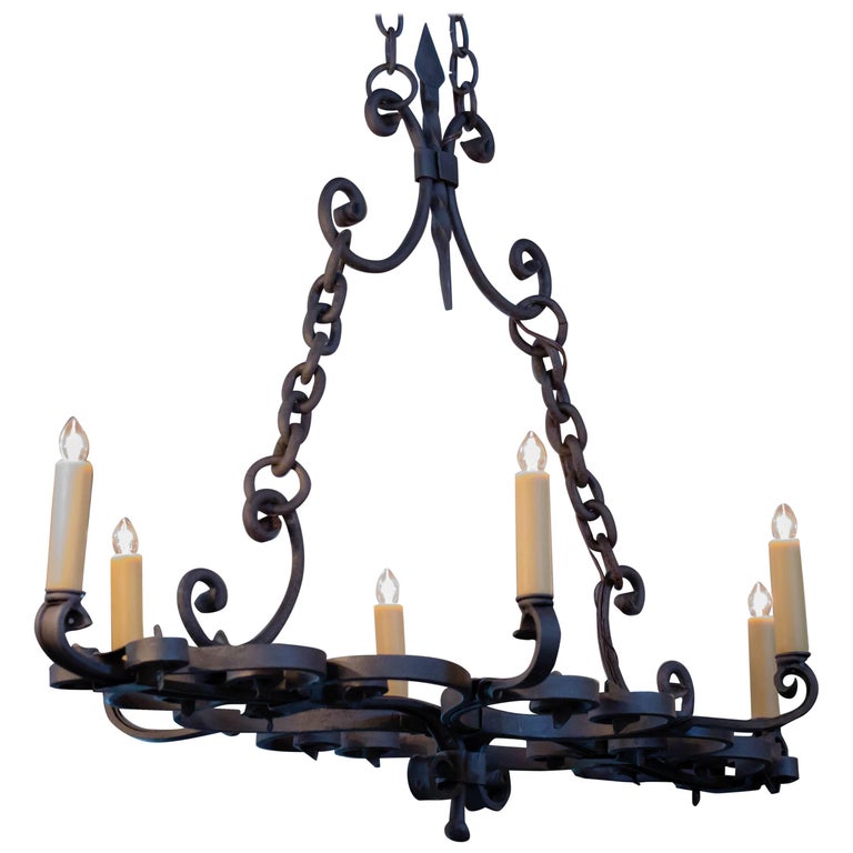 Spanish Linear Iron Chandelier , circa 1930 at 1stDibs