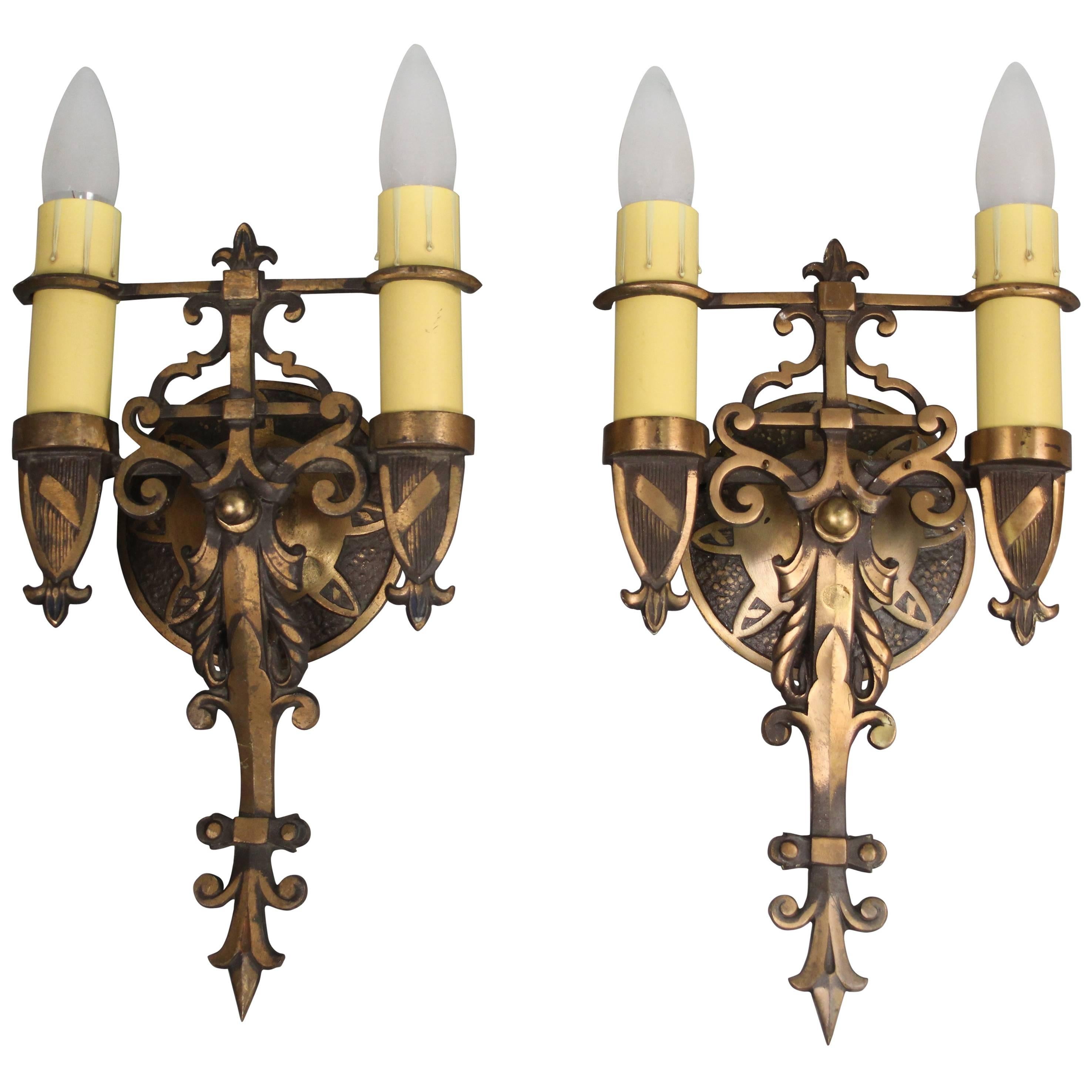 Pair of Antique Spanish Revival Brass Sconces circa 1920s with Shield Motif
