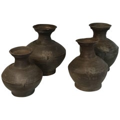 A Set of Four Antique Pottery Jars From The Han Dynasty