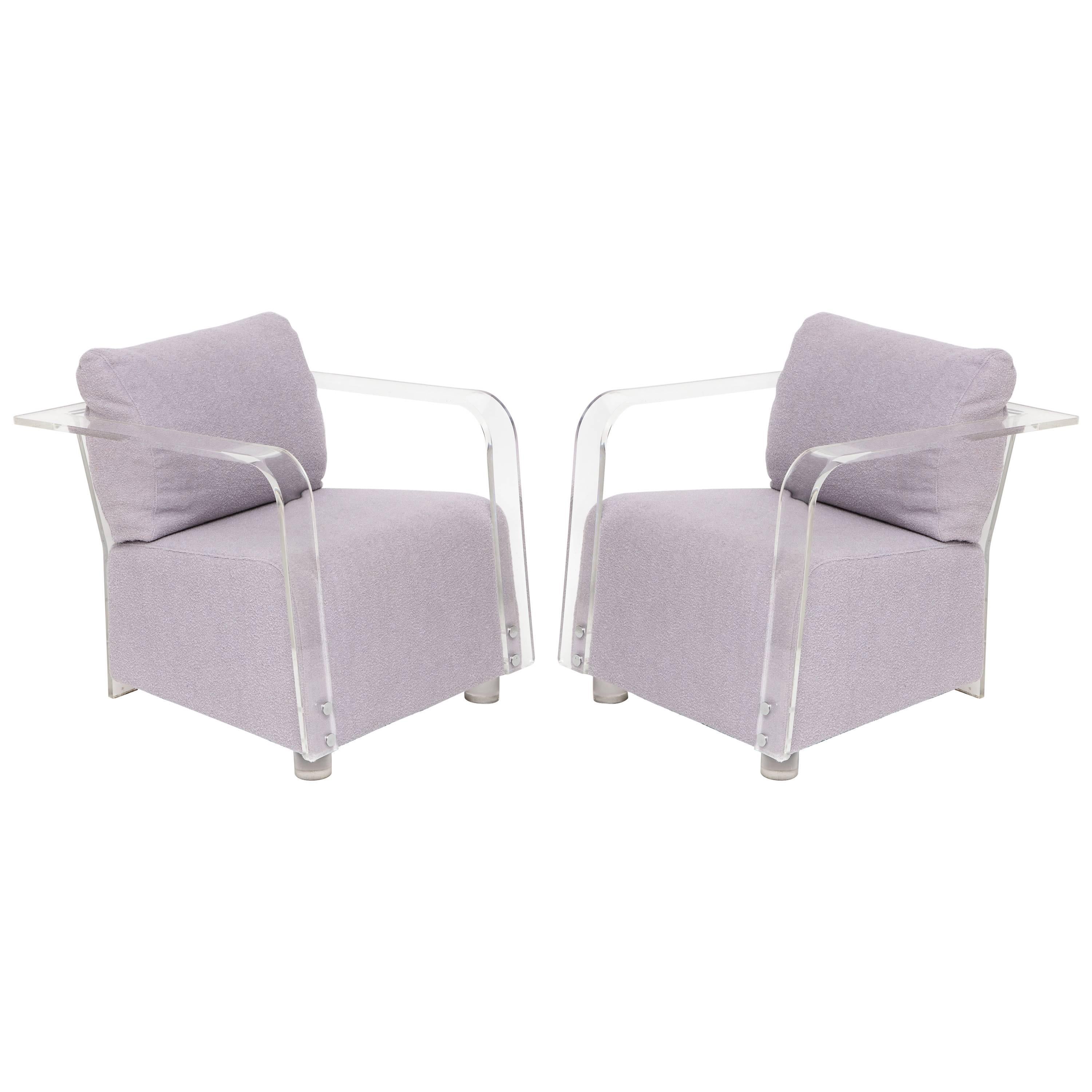 Lucite and lavender boucle pair of lounge chairs with chrome detailing, 1970s, France.

Lovely pair of 1970s Lucite French lounge chairs newly upholstered in lovely lavender wool boucle. The Lucite is in good overall condition.
Chic. Chrome
