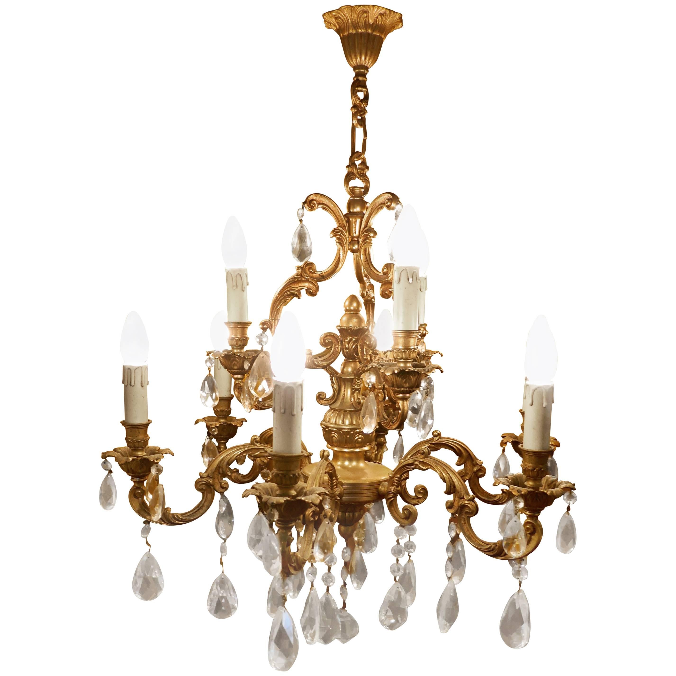Charming Large French Crystal and Brass Nine-Branch Chandelier