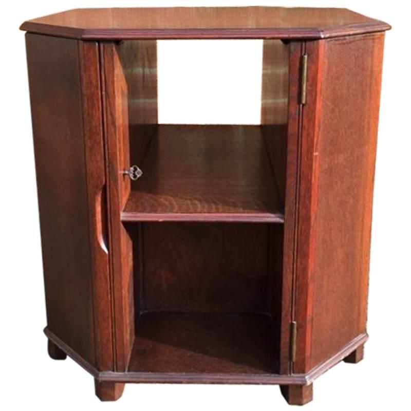Heals, Arts & Crafts Oak Cocktail table with Bottle Storage in the Side Doors For Sale