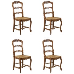 Vintage Set of Four French Louis XV Style Carved Oak Chairs with Rush Seats