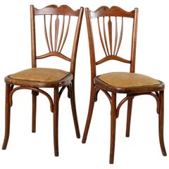 Pareja de sillas de bistró Thonet de madera curvada del periodo Art Déco francés de principios del siglo XX