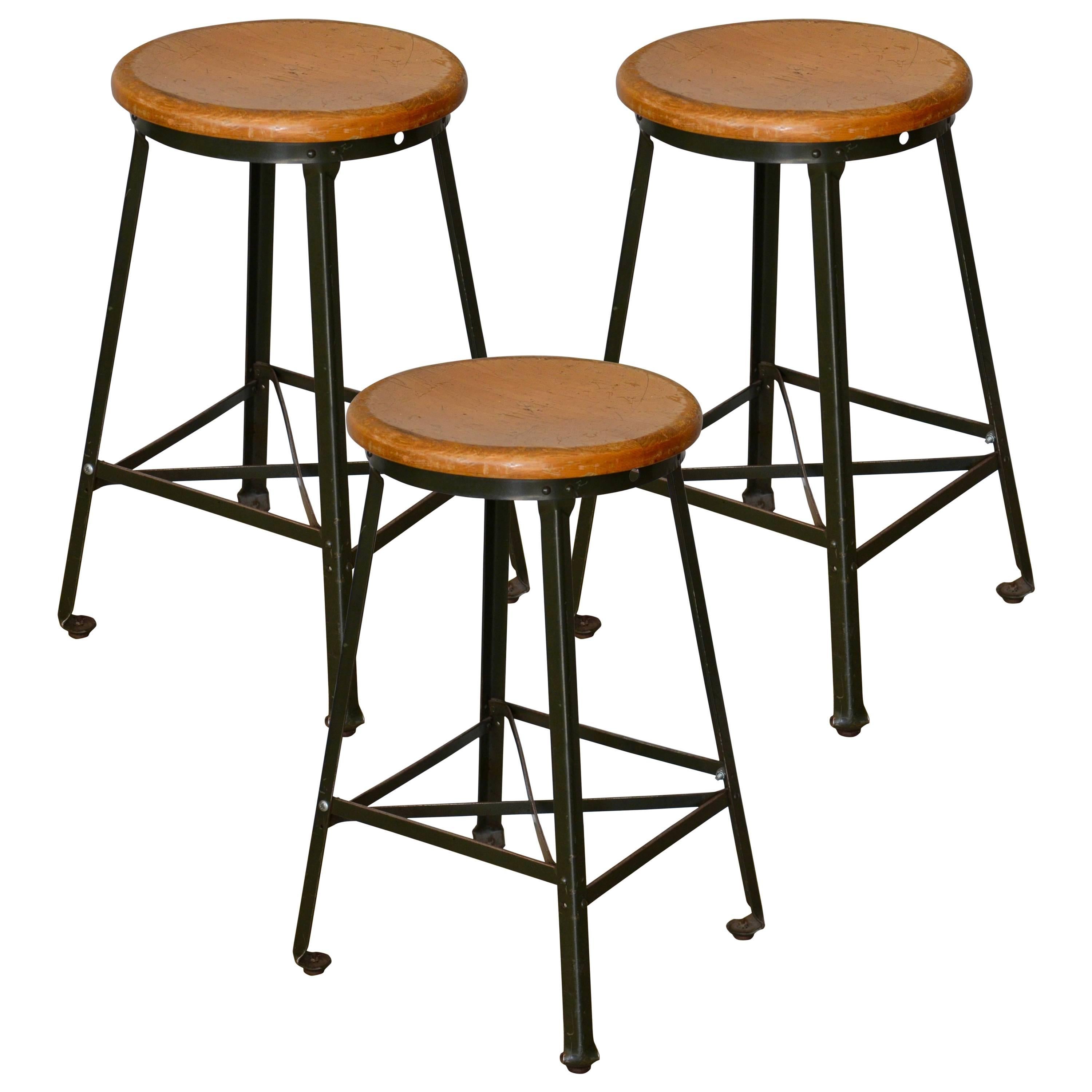 Great Set of Three Vintage Industrial Steel and Turned Wood Counter Stools