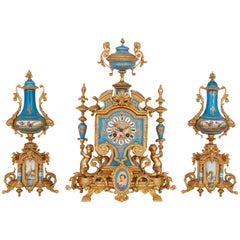 French 19th Century Gilt Metal and Sevres Style Porcelain Clock Garniture