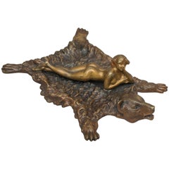 Austrian Bronze of a Nude Woman Lying on a Bearskin Rug by Franz Bergmann