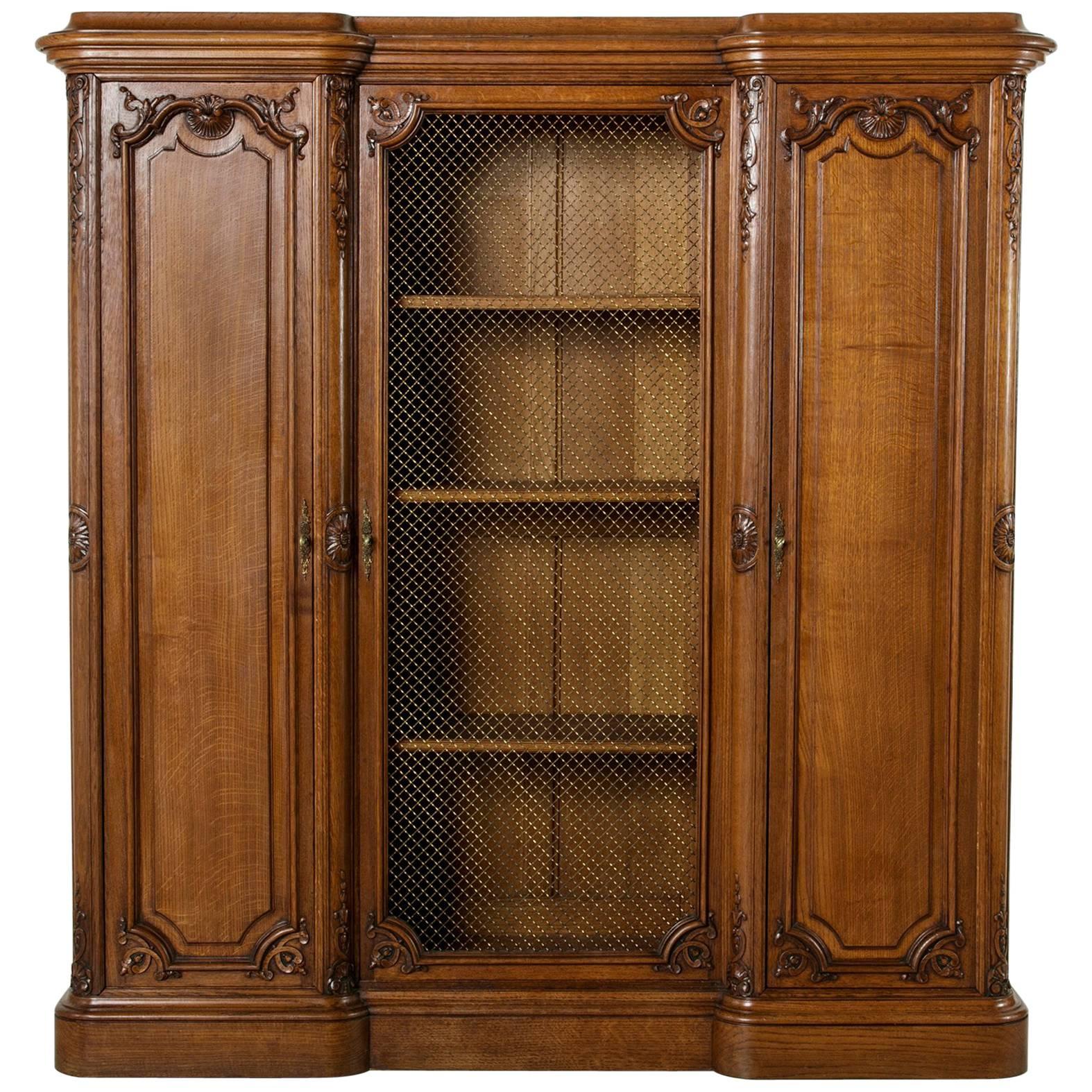 Early 20th Century Hand-Carved Oak French Regency Style Bookcase, Bronze Wire