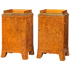 Pair of Early 20th Century Burr Amboyna Cupboards Incorporating a Slide