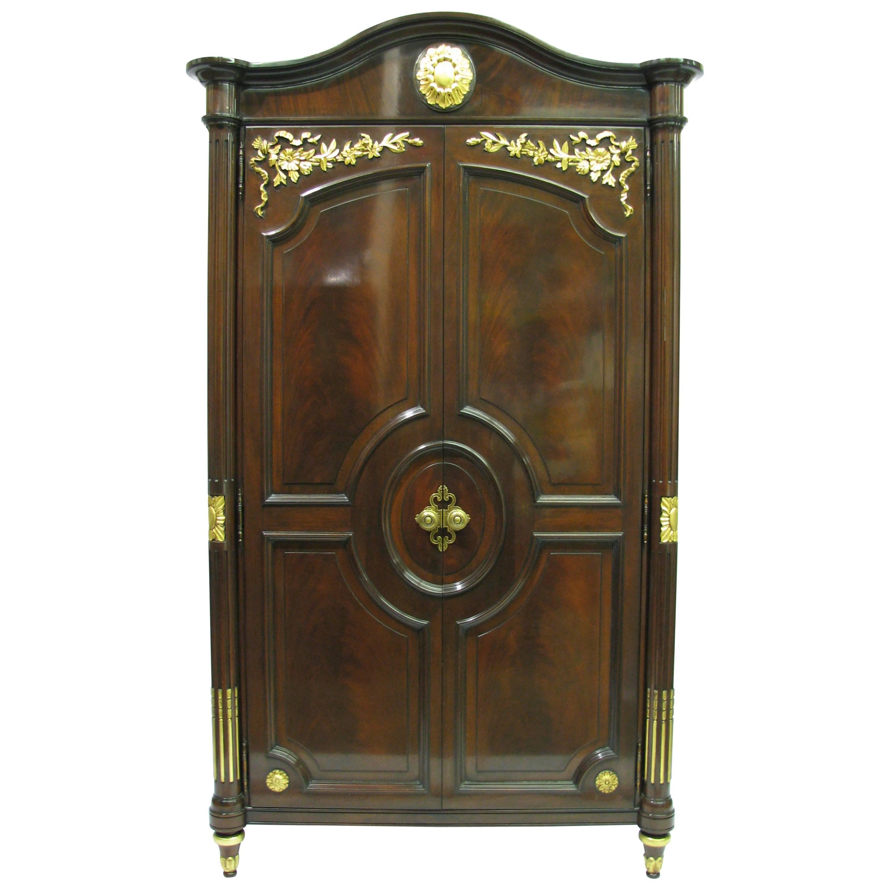 Karges Mahogany Louis XVI Style Armoire with Carved and Gilded Details For Sale